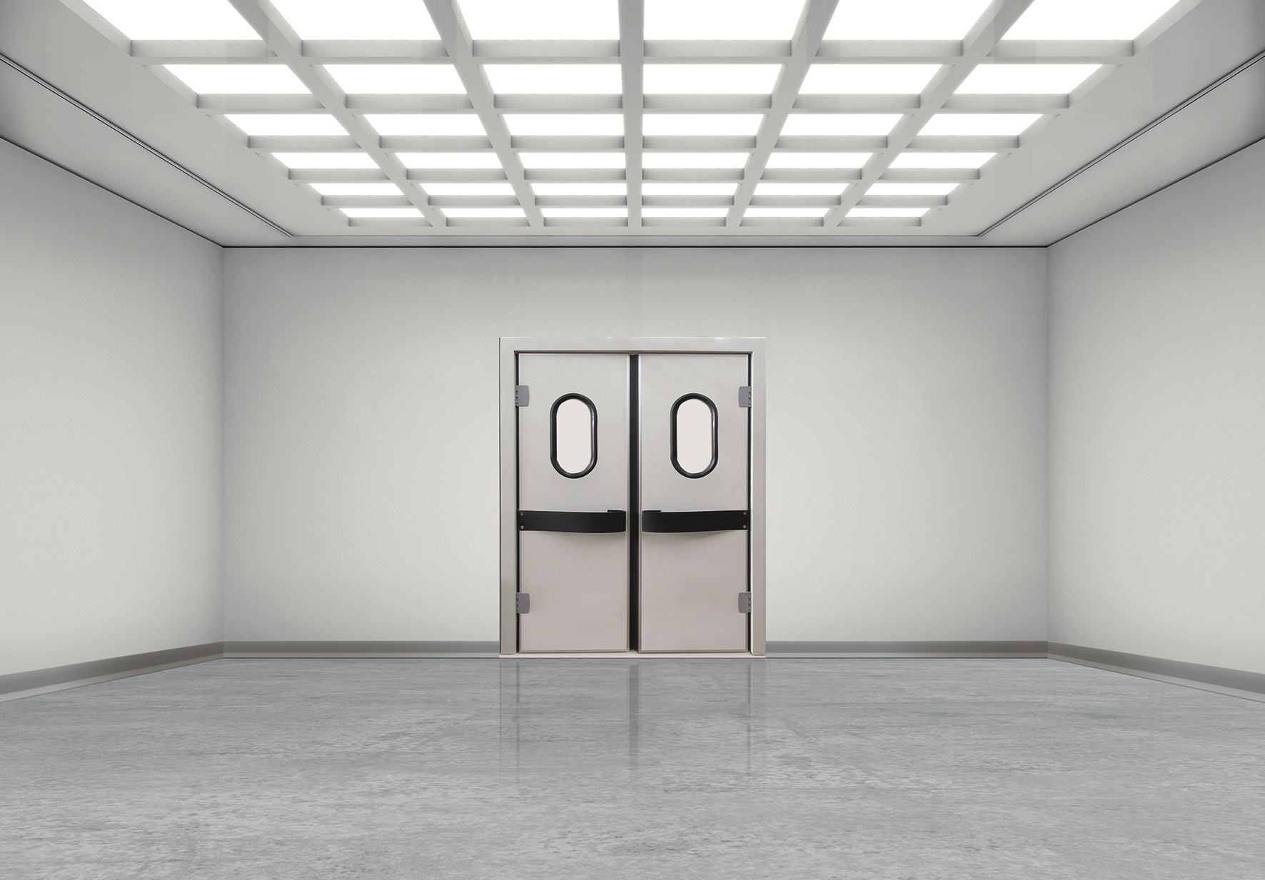Empty, brightly lit room with double swing doors and grid ceiling lights.