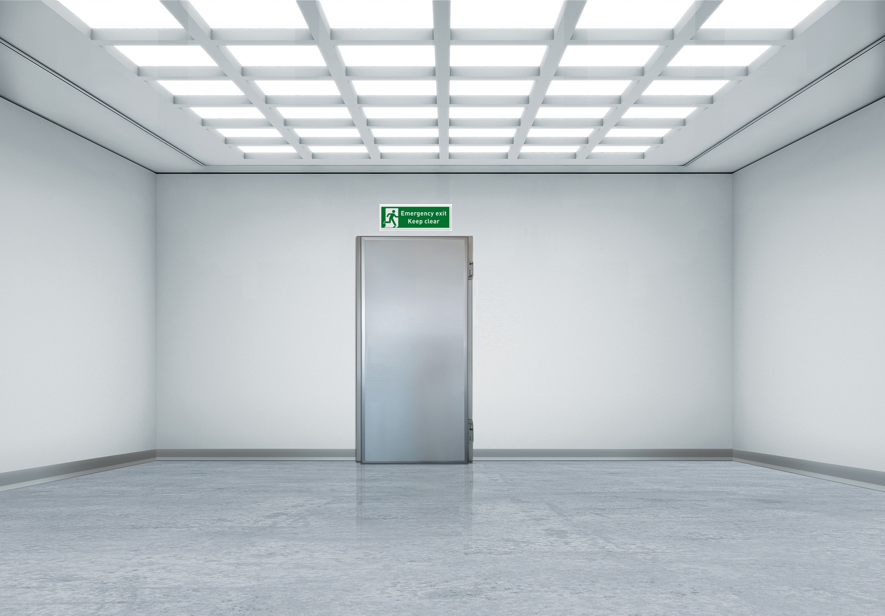 Empty white room with metal door, grid ceiling lights, and an "Emergency exit" sign.
